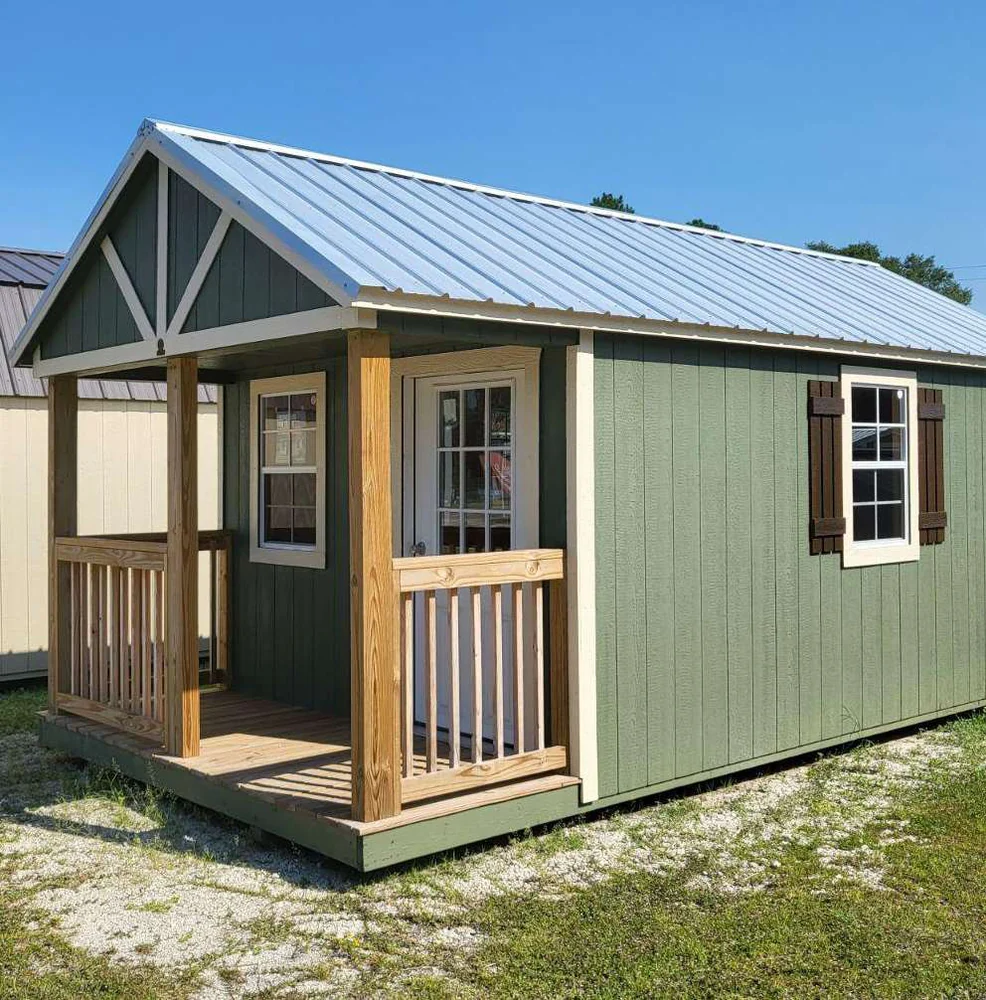 Green Circle E cottage cabin with a covered wood porch
